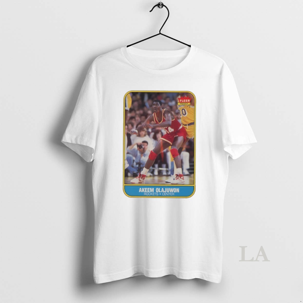 Original Paul Wall With The 1986 Fleer Akeem Olajuwon Rookie Card Shirt