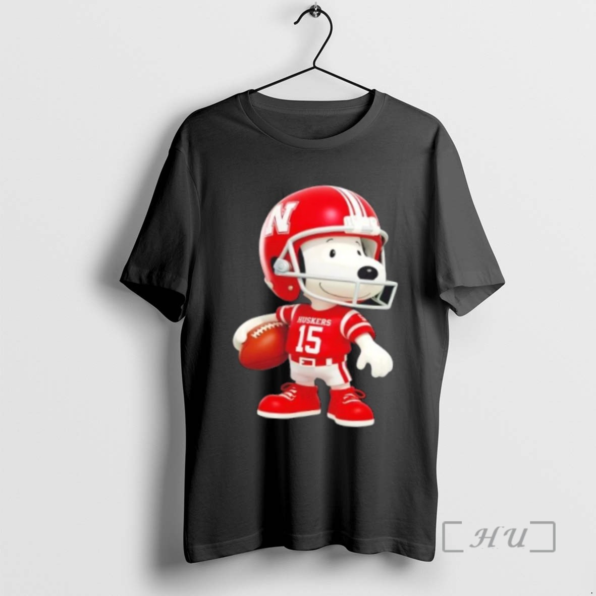 Trending Snoopy Is Holding A Ball And Smiling At Nebraska Cornhuskers Fans T Shirts Sweater Hoodie