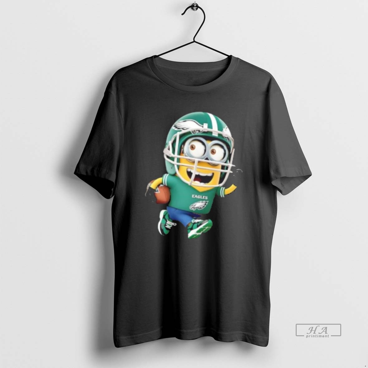 Trendy Minions Is Holding A Ball And Smiling At Philadelphia Eagles Fans Tee Shirt