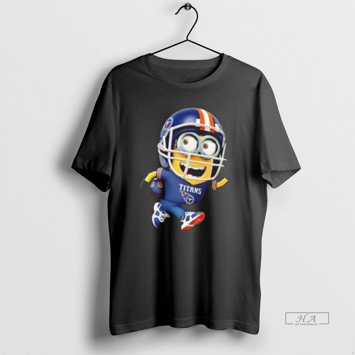 Trendy Minions Is Holding A Ball And Smiling At Tennessee Titans Fans Tee Shirt