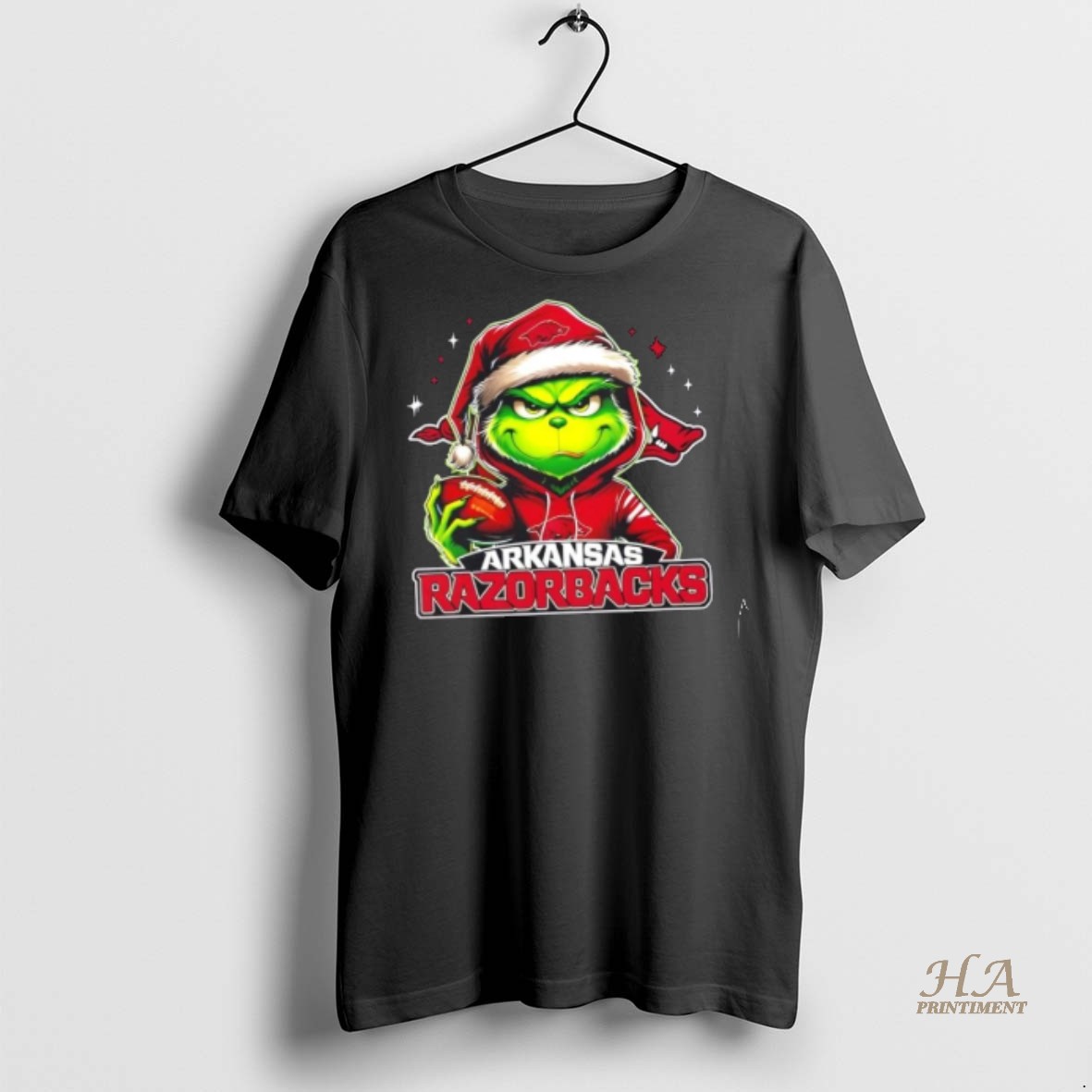 Official Grinch Is Holding A Ball And Smiling At Arkansas Razorbacks Fans Christmas Shirt Hoodie