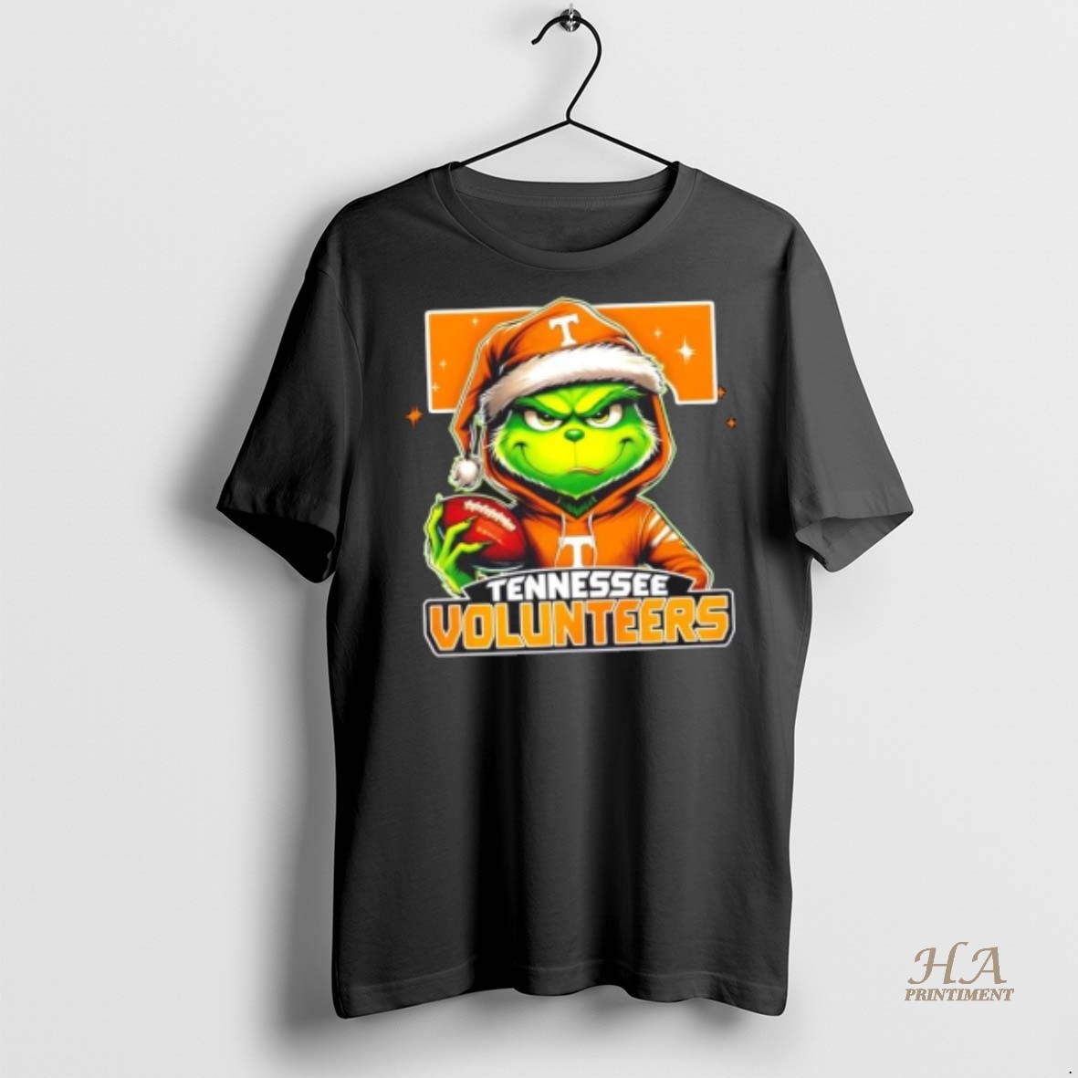 Official Grinch Is Holding A Ball And Smiling At Tennessee Volunteers Fans Christmas Shirt Hoodie